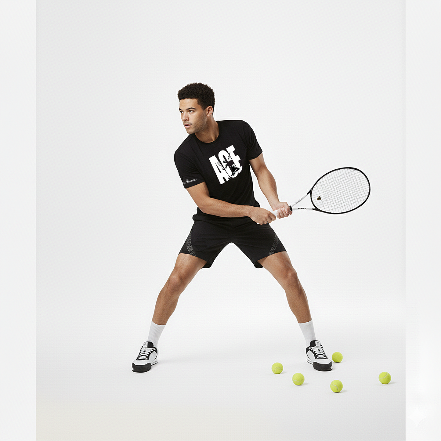 Man in black sports outfit with 'ACE' logo holding a tennis racket on a white background